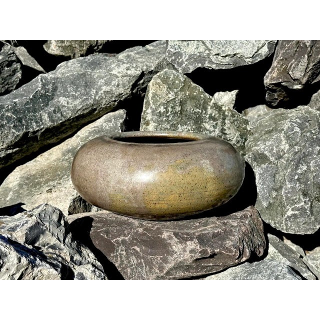 This high-quality studio ceramic art vessel was created and signed by a ceramic artist whom we have not yet been able to...