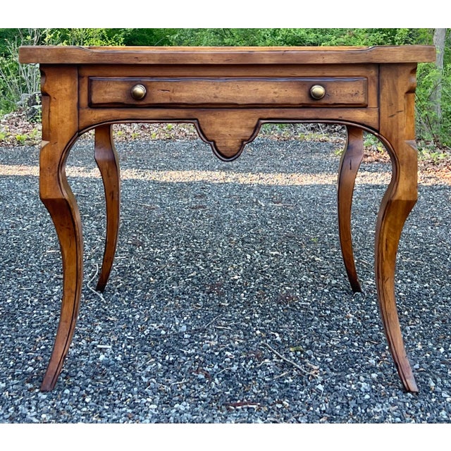 Oversized country French side or lamp table by Century Furniture. Crafted in solid maple with a rich amber tone. The table...
