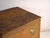 This antique Chinese painted trunk in elm wood is a dowry chest with a two-part sliding lid and a painted front. It...