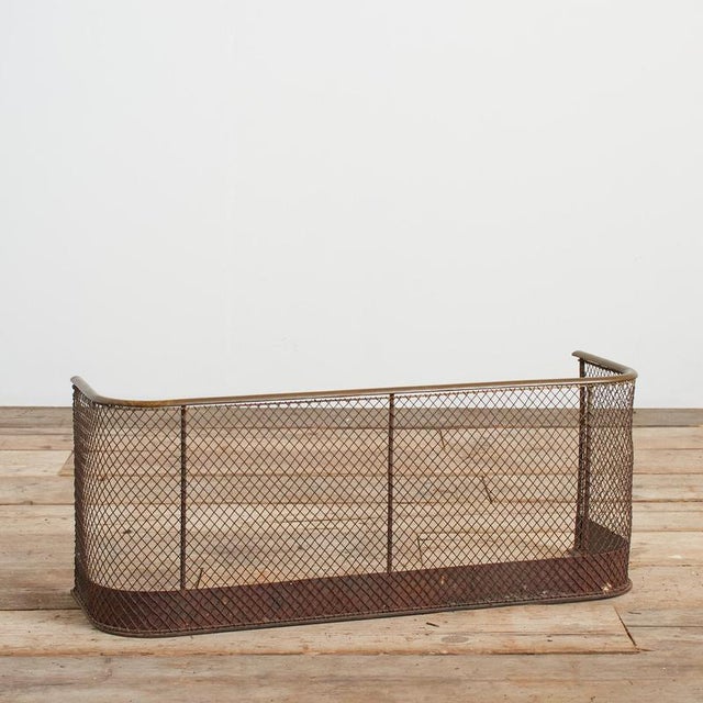 A small Victorian period fire guard fender in brass and iron with mesh grill. Original and intact. A great size for a...