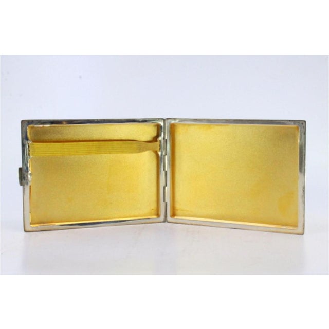 Matte Silver Cigarette Case with Smooth Strips and Gold Interior, in Very Good conditions. Designed 1920 to 1949 This...
