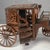This extraordinary vintage cigarette holder in the shape of a carriage is a fascinating example of finely openwork and...
