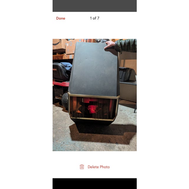 This item is a vintage Mid-Century Modern wall-mounted electric fireplace heater, similar to models produced in the 1960s...