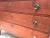 A beautiful Country Hepplewhite four drawer chest in original red paint of New England origin dating from 1800-1820...