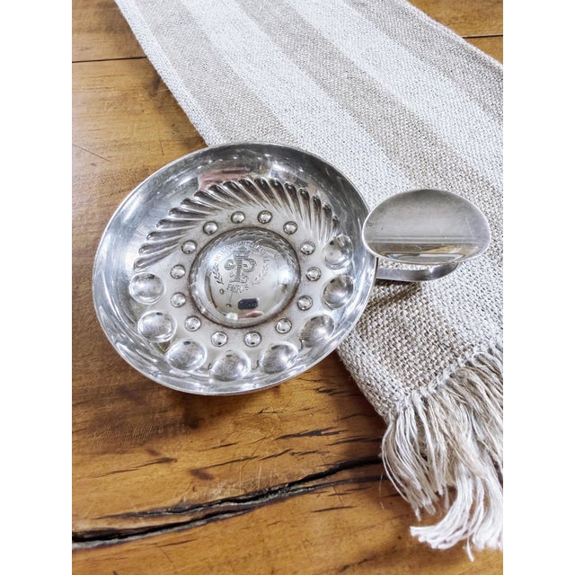 A beautiful vintage circa mid 1900s silver plated wine tasting cup or “tastevin," made by Christofle for the...