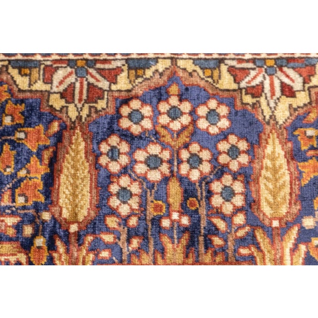 Central Persian city known for finely woven. room size and scatter rugs, with dominant reds and navy, and medallion...