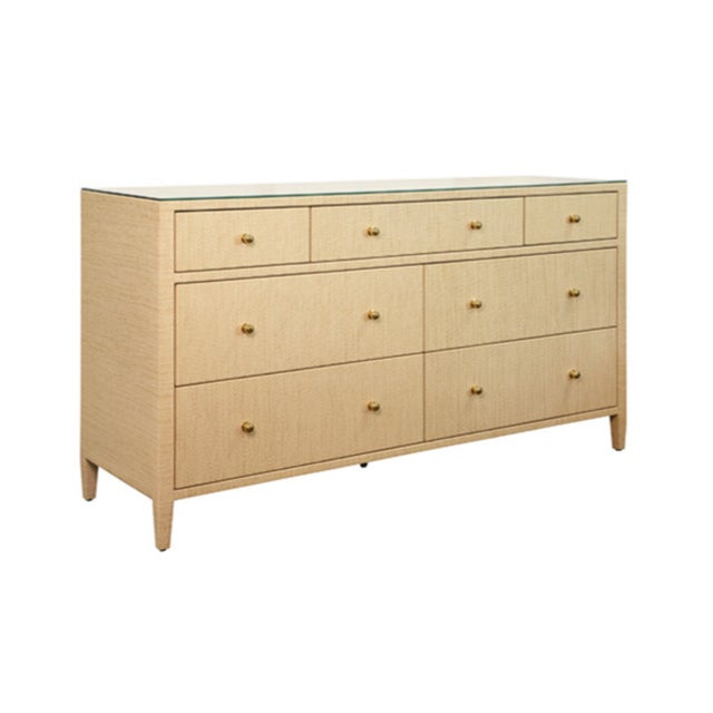 New special order item. Not vintage. Wrap your space in serene elegance with this seven-drawer chest, wrapped in natural...