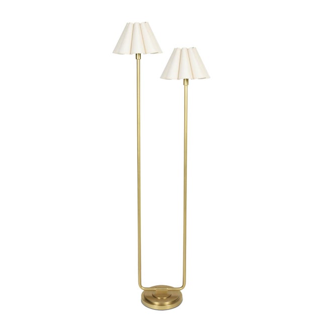 The Polly Floor Lamp exudes timeless elegance with its two scalloped shades, casting a soft, comforting glow that enhances...