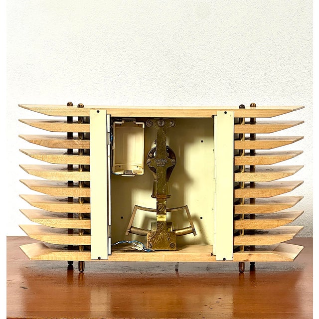 Charming vintage mantel clock from the 1960s, produced by the German brand KUNDO Electronic, a symbol of precision and...