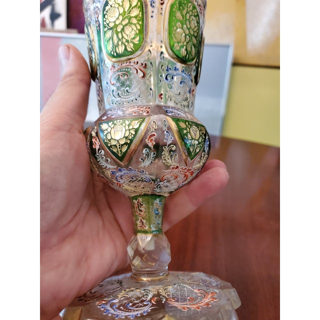 A very fine 100 years old or older large moser goblet with rich raised gold and enamel decoration. Exquisitely painted on...