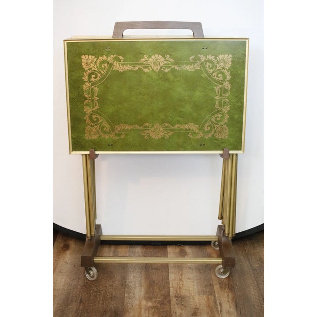 Nice set of Vintage Lavada TV Trays with Stand. They are Avocado Green with Gold floral design, with sparkly lucite...