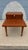 American of Martinsville walnut step end table, circa 1960s, showcasing the brand’s signature balance of clean lines and...