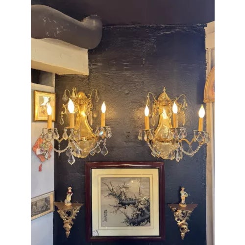 Contemporary Pair of Rococo Style Brass and Crystal Bi Level Three Light Sconces. Great design and with wiring intact and...