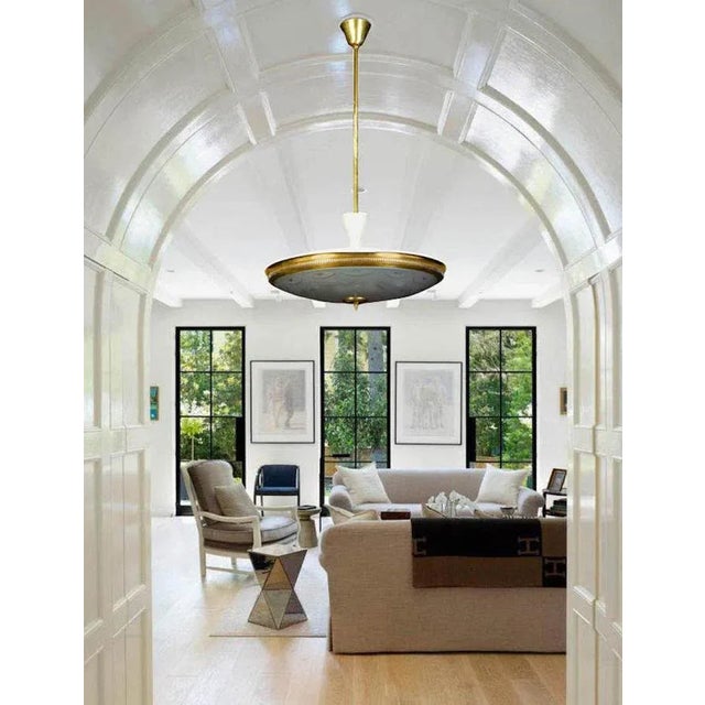 Rare and early pendant by Luigi Brusotti with precious engravings on the crystal etched acid disc, supported by a partial...