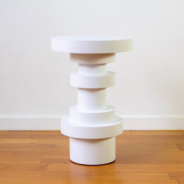This listing is for 1x Tall Sass Side Table from Souda in White. This piece is a factory 2nd. The top is ever so slightly...