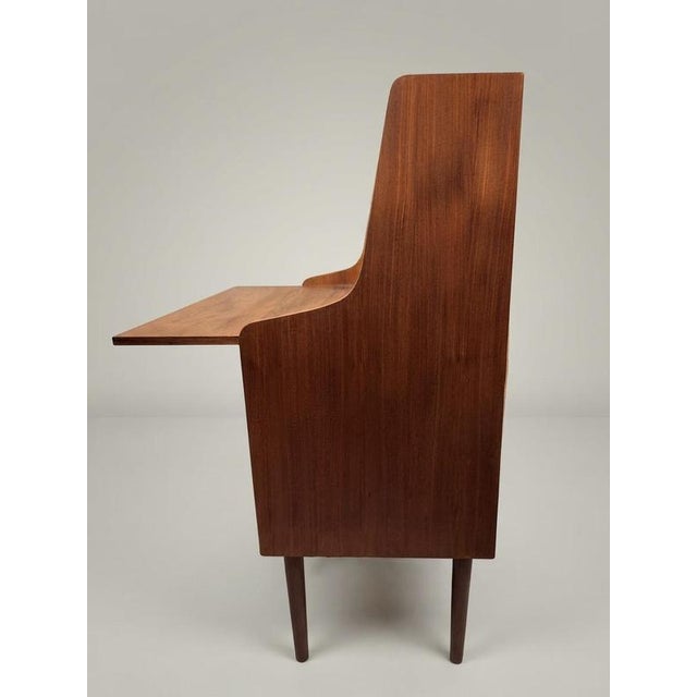 Transform your home office with this elegant Danish mid-century secretary desk, a perfect marriage of Scandinavian...