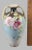 We are pleased to be offering this elegant hand painted with wild roses flowers and gold gilt detail vase, in good...