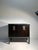 Vintage 1970s Petite Cabinet with large Decorative Bohemian Pulls. The top is a metal. Cabinet makes for a nice Bar...