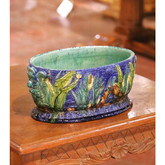 Add a vibrant decorative touch to your interior with this antique majolica cache pot. Crafted in France, circa 1880, the...