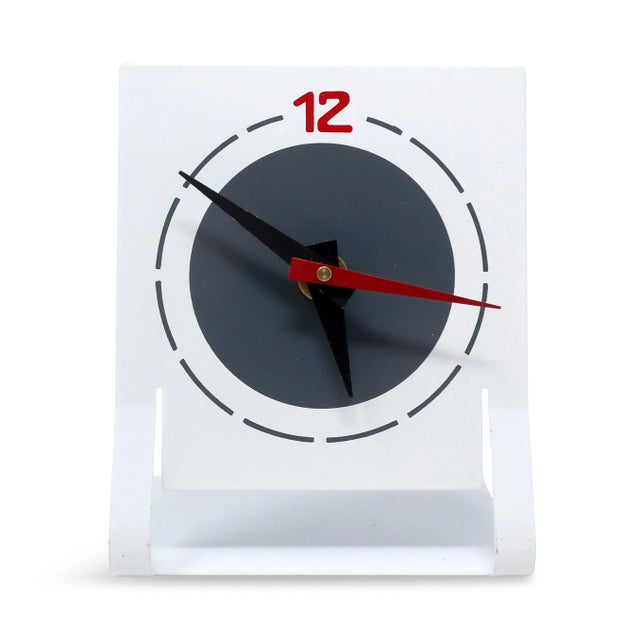 A postmodern desk or table clock by Time Square. This "fashionable timepiece" (the manufacturer's language on packaging)...