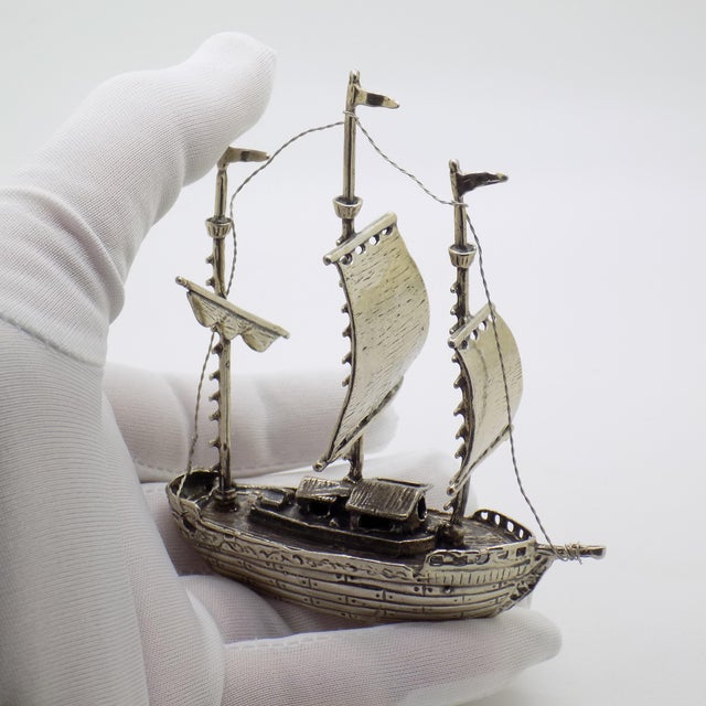 An impressive vintage Italian sculpture depicting a galleon sailing ship, handcrafted in Arezzo, Tuscany in 1991 in...