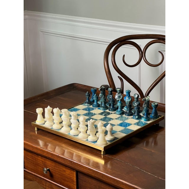 Chinese hand carved soapstone chess set in turquoise blue and creamy white with a two-sided, inlaid board housed in a foot...