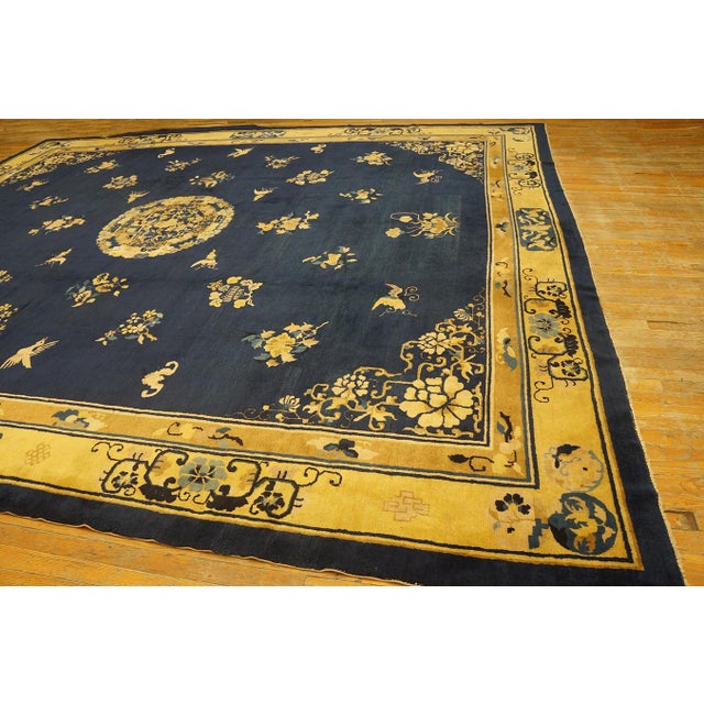Special Flowers Bordering a Medallion in the Center in a Navy Background Color Antique Chinese Peking Rug For Sale - Image 4 of 4
