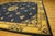 Special Flowers Bordering a Medallion in the Center in a Navy Background Color Antique Chinese Peking Rug For Sale - Image 4 of 4