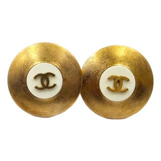1990s Chanel Vintage Gold Plated CC White Disc Clip on Earrings, A Pair For Sale