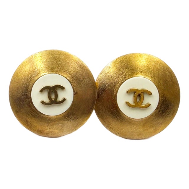 1990s Chanel Vintage Gold Plated CC White Disc Clip on Earrings, A Pair For Sale