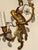 Exceptional pair of French Bagues style bronze wall sconces. Featuring sculpted birds perched on scrolling branches....