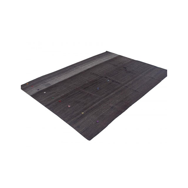 Vintage handwoven decorative kilim rug from Afyon region of Turkey. Approximately 50-60 years old. In very good condition.