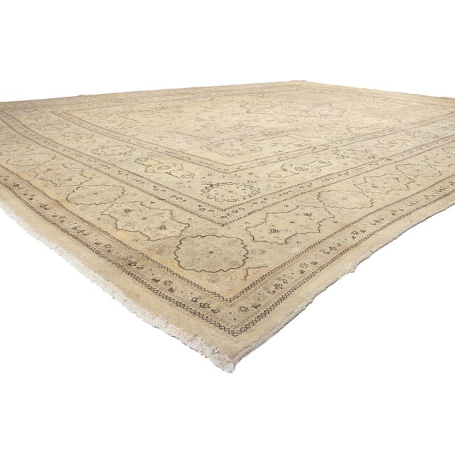 78595 Vintage Persian Tabriz Rug, 13'09 x 18'10. Emulating relaxed elegance with incredible detail and texture, this hand...