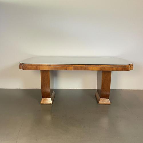 1930's art deco desk with glass top in walnut burr. Would also work as a dining table. In very good vintage condition....
