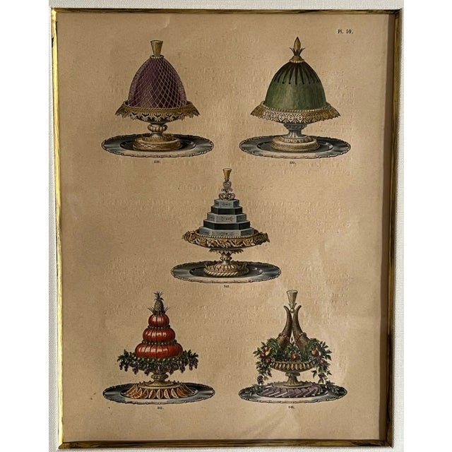 This antique colored gastronomy print is an engraving representing five elaborately prepared dishes from the book "La...