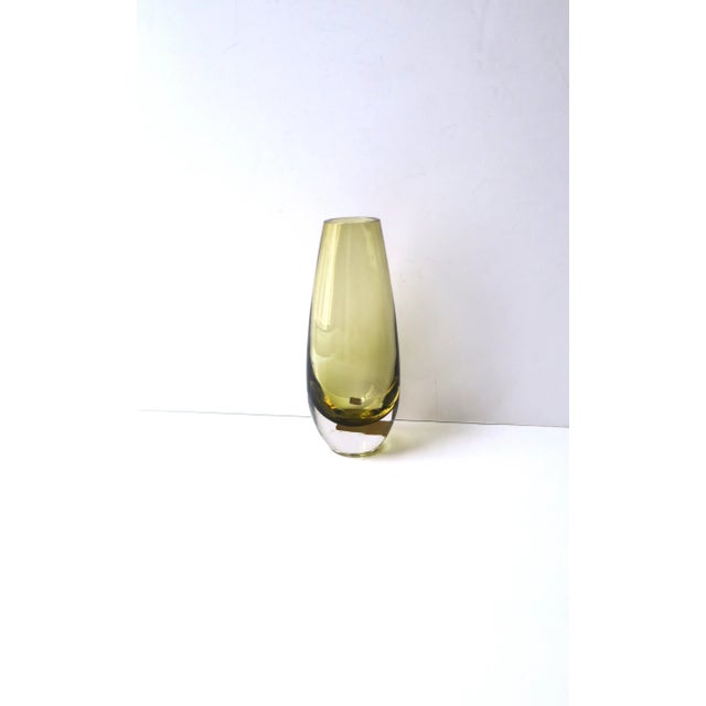 A Swedish light-yellow glass vase, Midcentury Modern Scandinavian Modern, Sweden, circa mid-20th century. Very good...