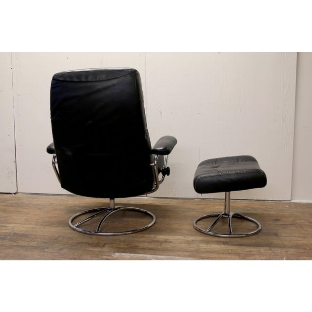 1970s Ekornes Stressless Black Leather Recliner Chair and Ottoman Chairish