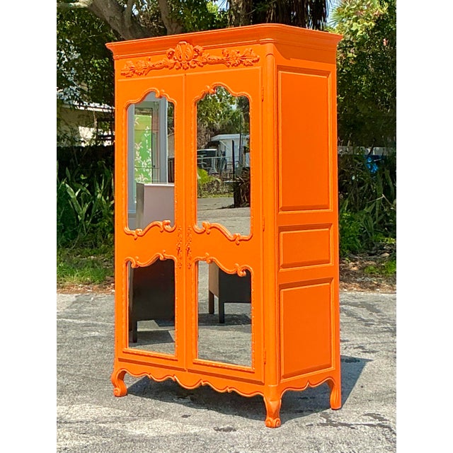 Make a daring design statement with this showstopping Vintage Regency Lacquered Armoire. Finished in a vivid orange...