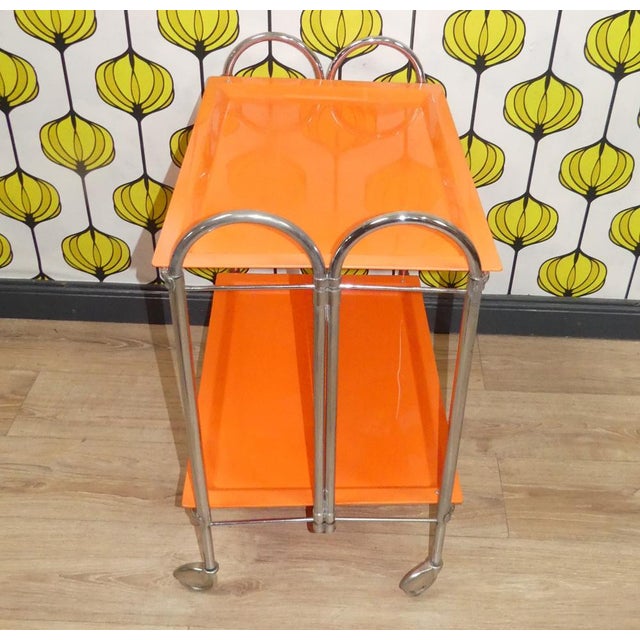 Cool, foldable cart Side table on roles Bar wagon, serving cart, tea truck Two parking spaces, the upper can also be...