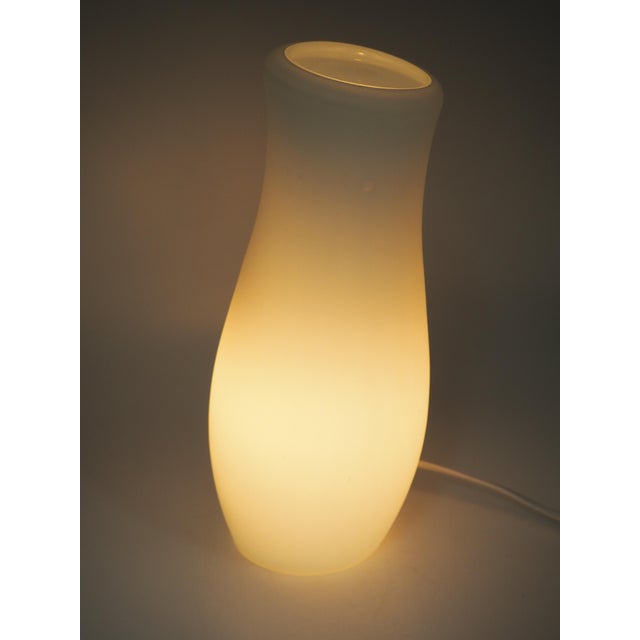 A pair of sculptural table lamps from IKEA's MYLONIT series, designed by Kristin Leibel & Kristian Andersson. The lamps...