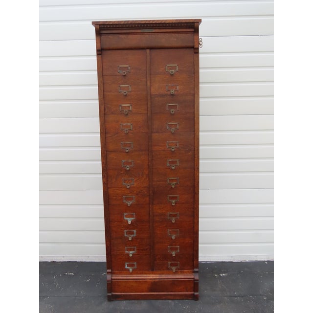 Not a typical file cabinet this remarkable American Antique dates to the early 1900s and showcase a brilliant piece of...