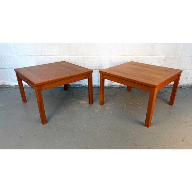 Exquisite Danish Mid-Century Modern teak end tables from the renowned Interform Collection. Timeless in design and...