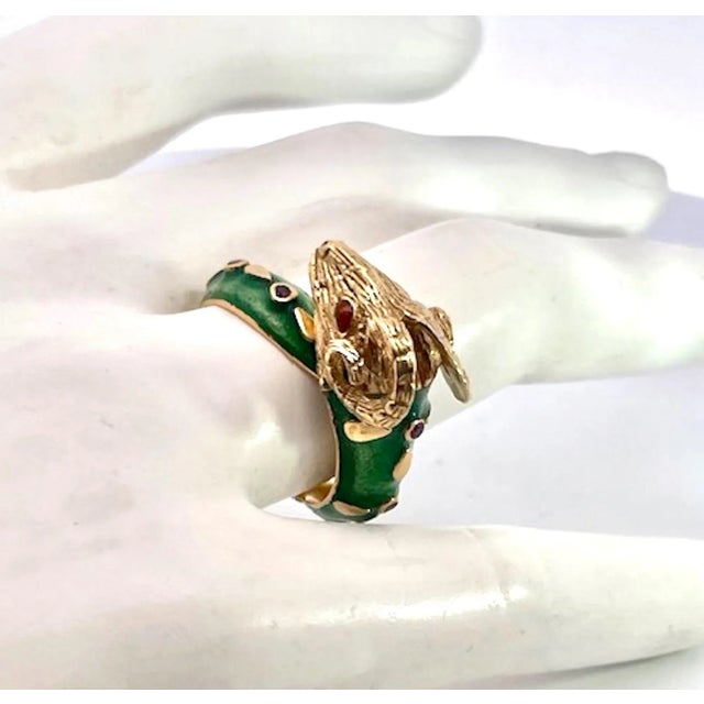This enamel Rams ring is very special. It is enameled in Green with Ruby accents throughout. This ring is used and the...