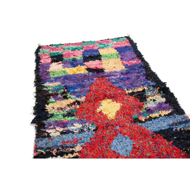 Originating from Morocco in the 1950s, this vintage midcentury Moroccan fabric rug depicts a culturally vital symbol in...
