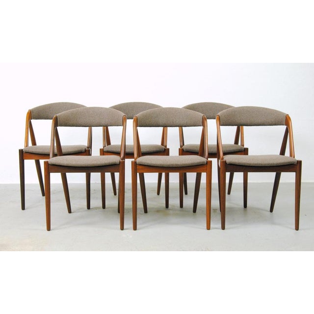 Kai Kristiansen set of six fully restored teak dining chairs by Schou Andersens Møbel Fabrik including custom upholstery....