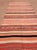 Authentic vintage Moroccan Berber flat-weave kilim rug, handwoven in wool and distinguished by its exceptionally long,...