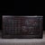 A beautifully crafted Chinese hardwood box, likely made of rosewood (Tanmu), featuring deep relief carvings. The lid is...