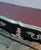 French Louis XV Writing Desk With Burgundy Top & Ornate Bronze Mounts & Silver Leaf For Sale - Image 4 of 6
