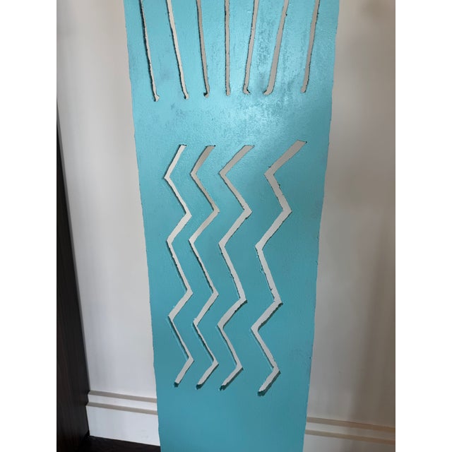 Stunning tall metal sculpture by Navajo Nation artist.