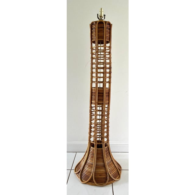 Vintage Crespi Style Rattan floor lamp features stacked rattan vase and great fretwork. Top covered in woven rattan.
